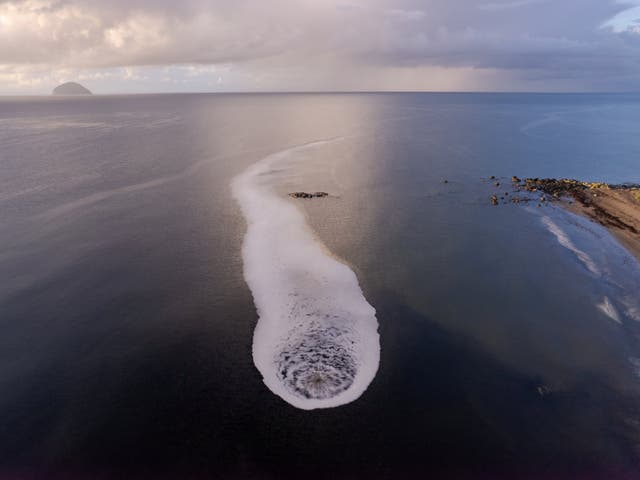 <p>Drone photographs have captured the whirlpool off the coast of Scotland</p>