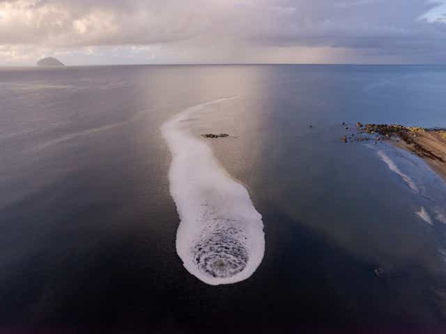 <p>Drone photographs have captured the whirlpool off the coast of Scotland</p>