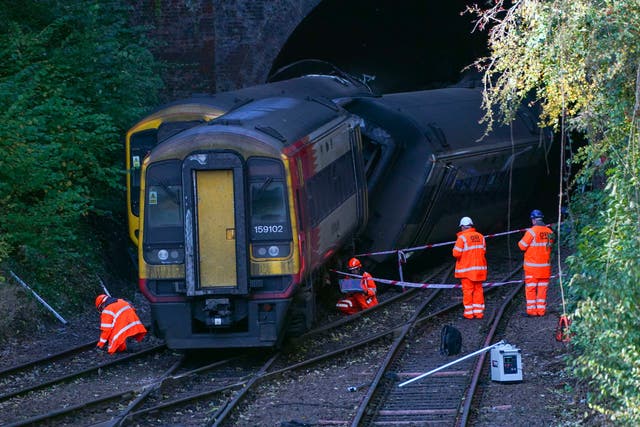 <p>Specialist officers and detectives remain on scene to establish how the trains collided </p>