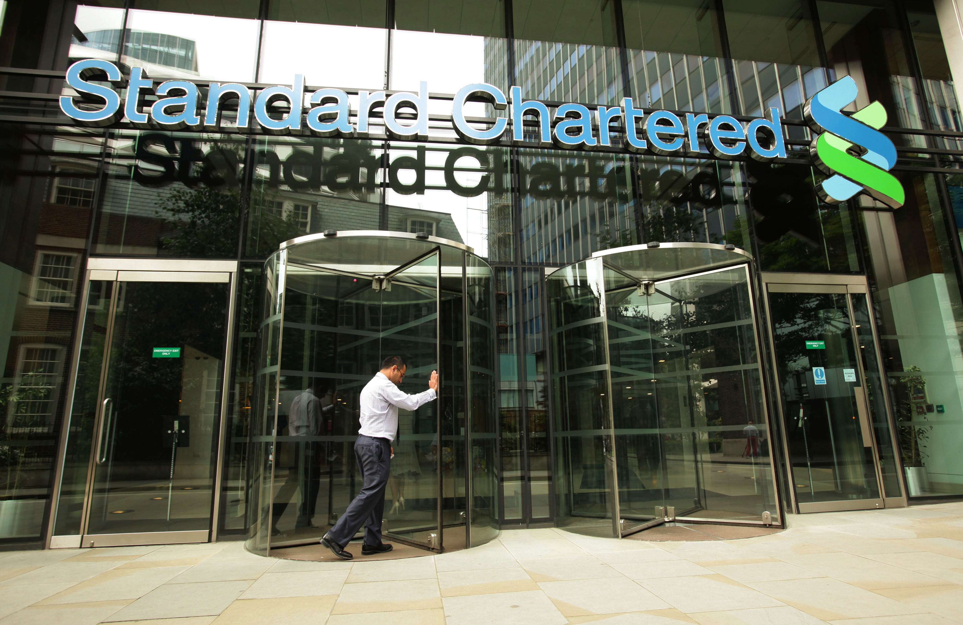 Emerging markets-focused bank Standard Chartered has seen shares come under pressure after warnings of an ‘uneven’ recovery and supply chain woes took the shine off a 44% jump in profits (Yui Mok/PA)