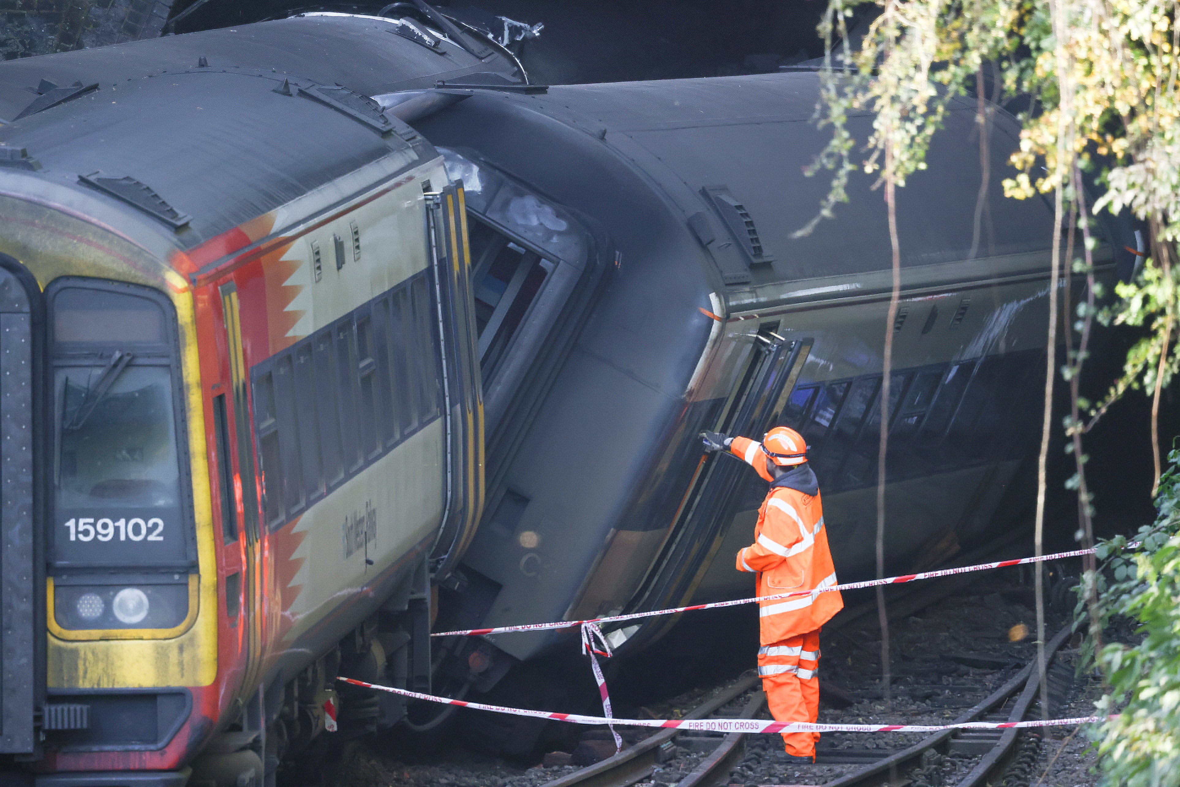 A South Western train service struck a Great Western train “at an angle such that both trains derailed and ran alongside each other into the tunnel”, investigators said