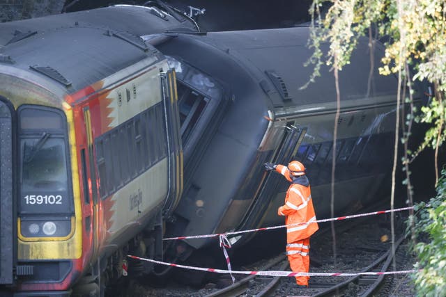 <p>A South Western train service struck a Great Western train “at an angle  such that both trains derailed and ran alongside each other into the tunnel”, investigators said </p>