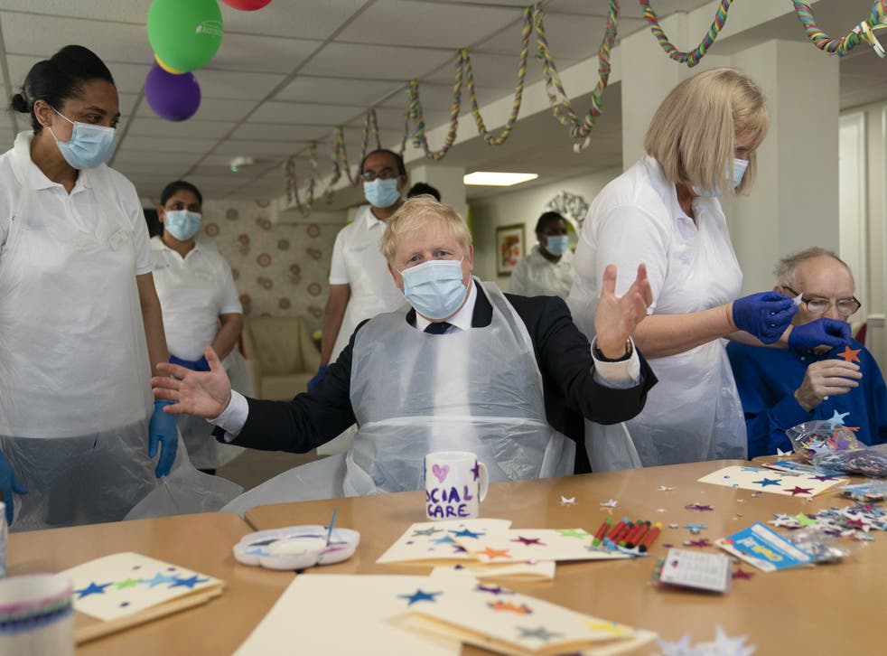<p>Boris Johnson during a visit to Westport Care Home in Stepney Green</p>