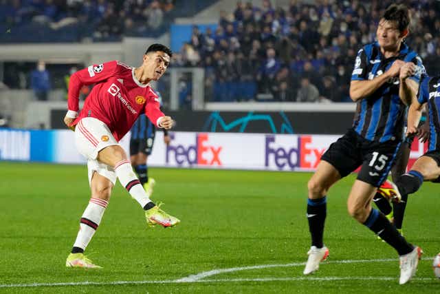Cristiano Ronaldo fires Manchester United’s last-gasp equaliser against Atalanta (Luca Bruno/AP)