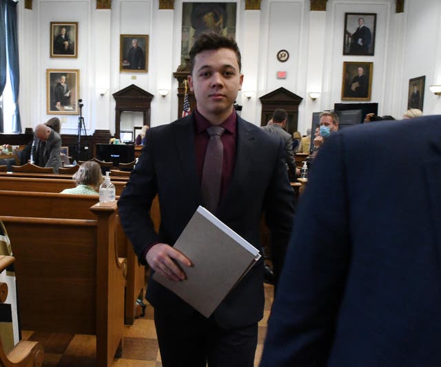 <p>Kyle Rittenhouse leaves for a lunch break during his trial at the Kenosha County Courthouse on 2 November 2021 in Kenosha, Wisconsin</p>