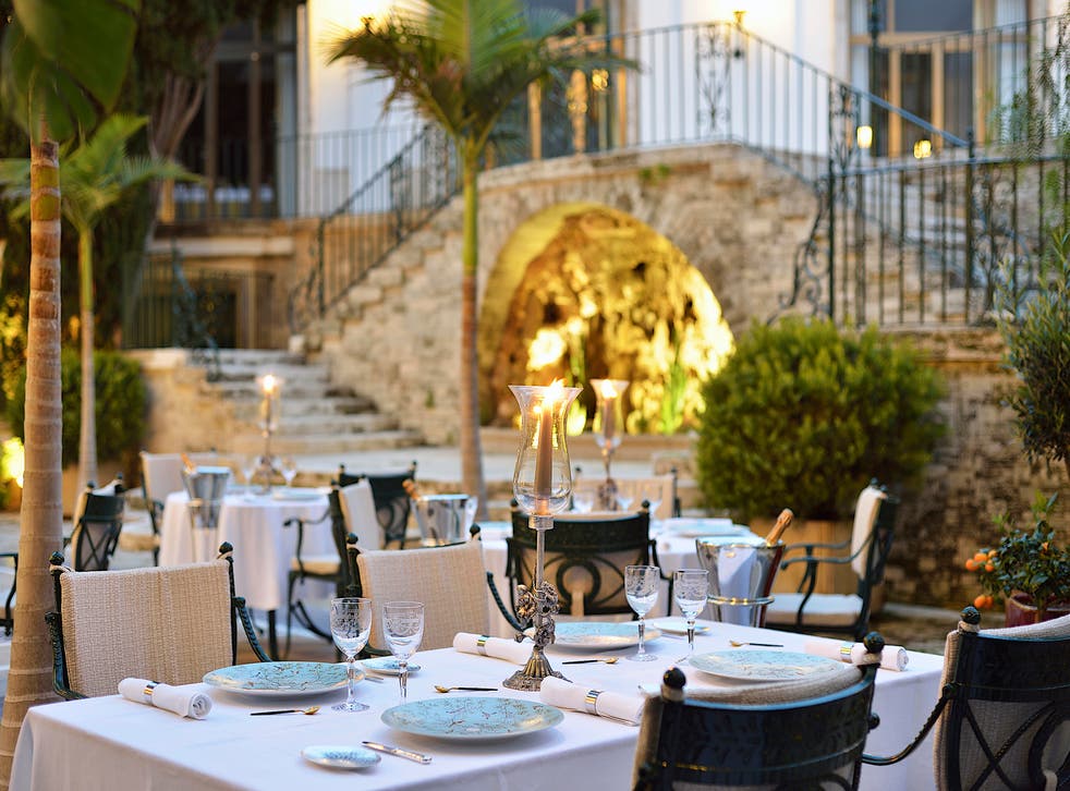 The hacienda-style dining terrace at Candelight by Romain Fornell (Hostal de la Gavina/PA)