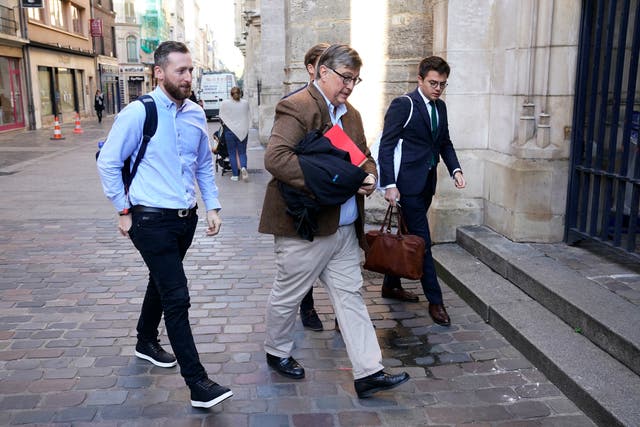 <p>Jondy Ward (left), the skipper of a Scottish-registered scallop dredger being held in Le Havre, arrives at the Court of Appeal in Rouen on Wednesday </p>