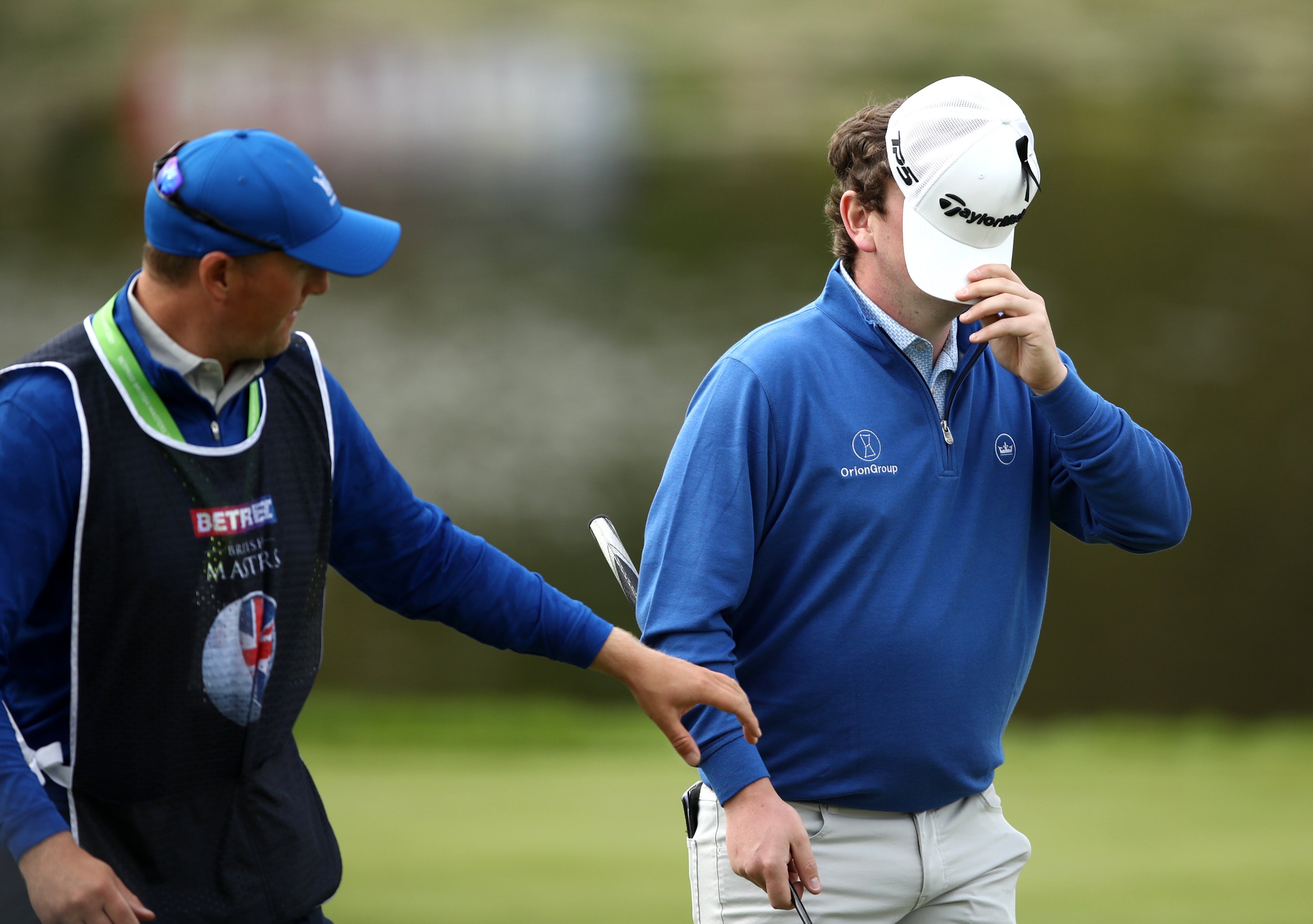 Scotland’s Robert MacIntyre (right) reacts after putting on the 18th green during day three of the Betfred British Masters at The Belfry (Tim Goode/PA)