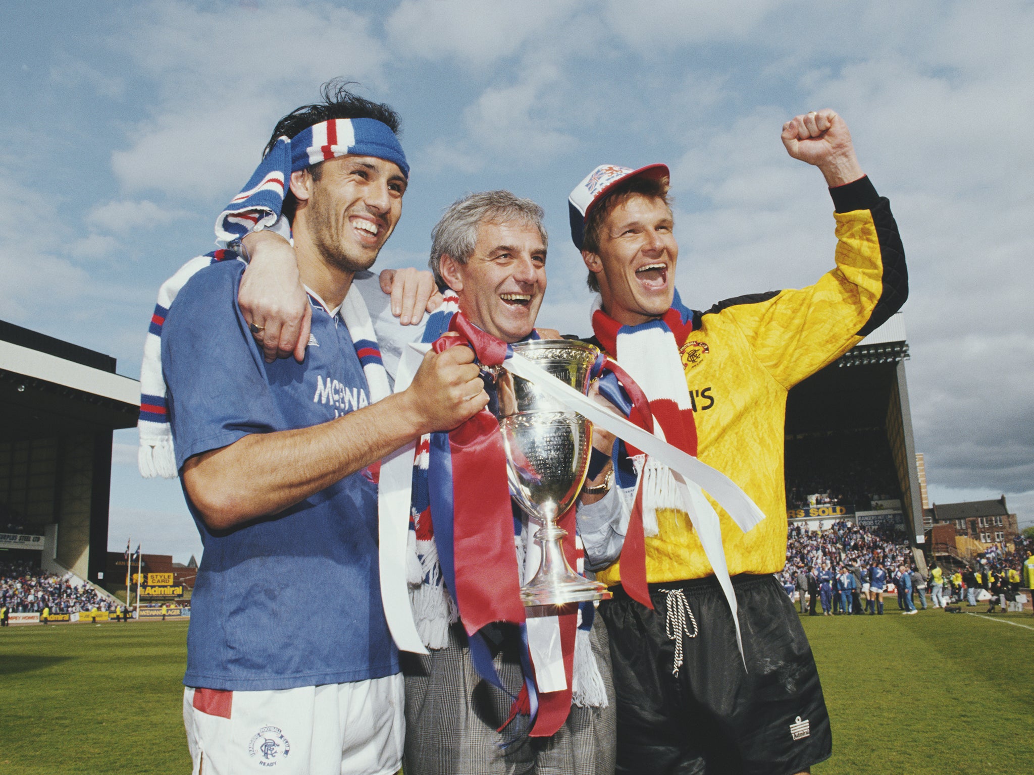 Celebrating with Mark Hateley (left) and Chris Woods after clinching the league title with a 2-0 win over Aberdeen at Ibrox in May 1991