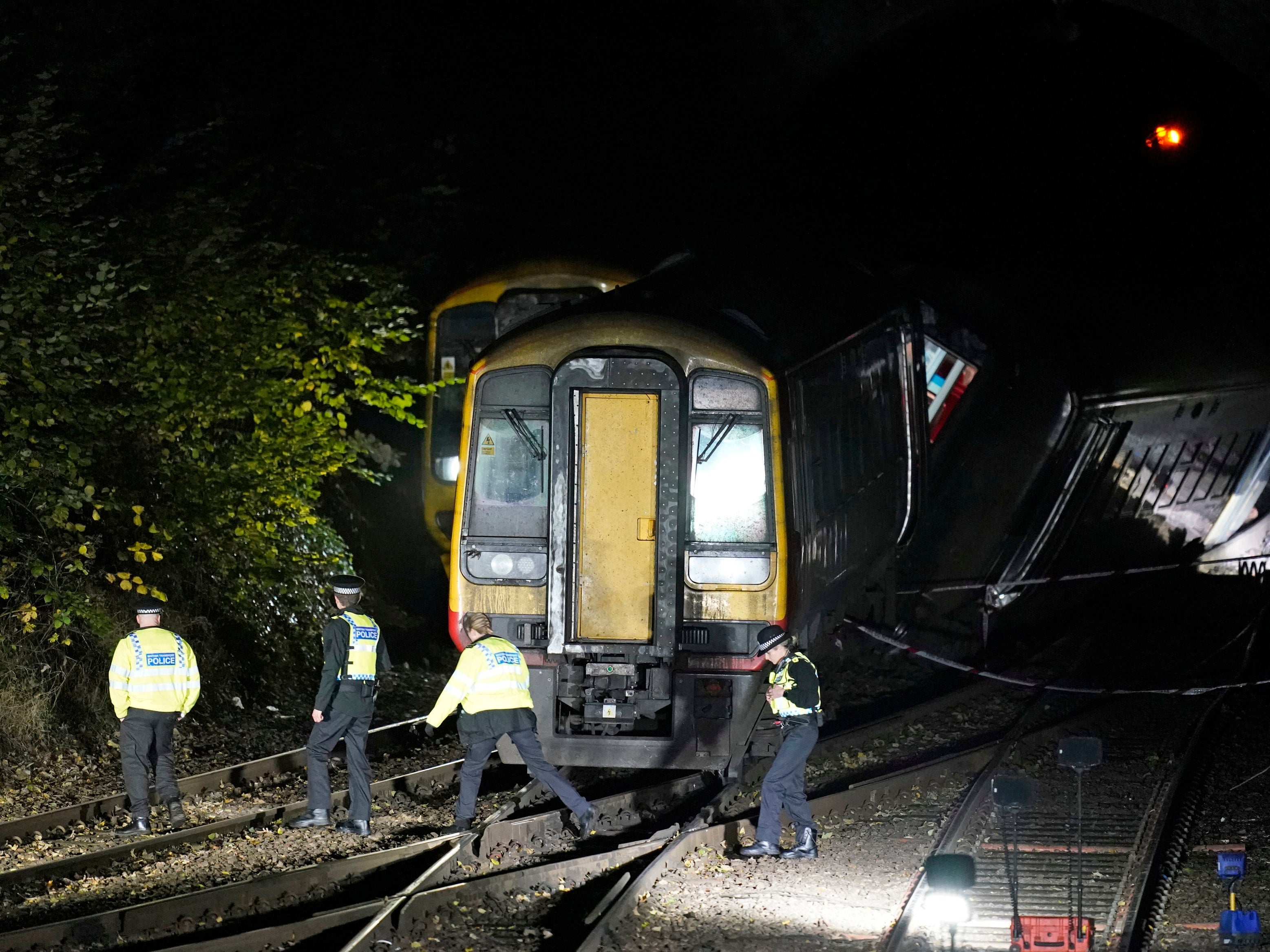 Emergency services at the scene of a crash involving two trains near the Fisherton Tunnel between Andover and Salisbury in Wiltshire.