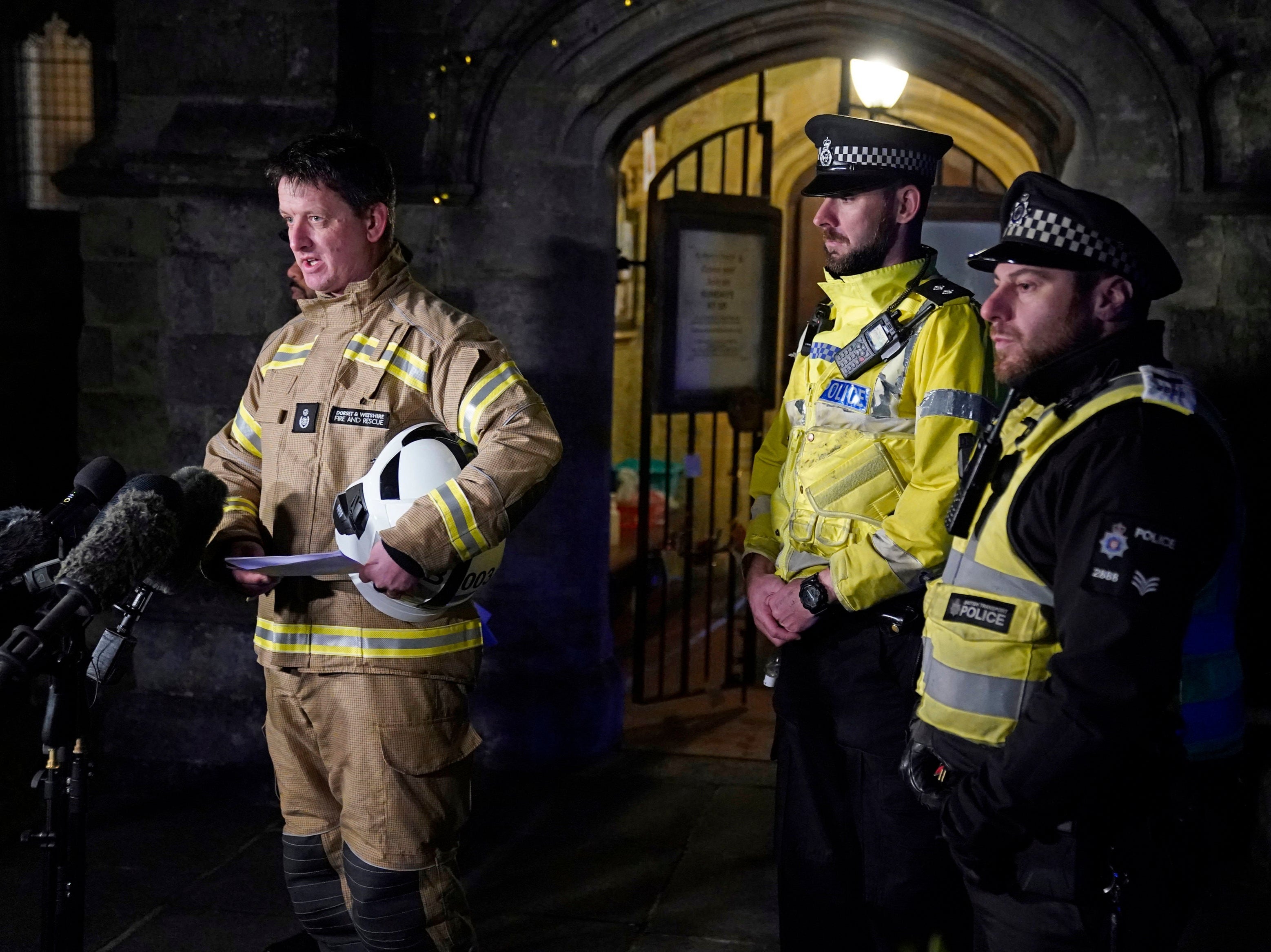 Andy Cole (left) from Dorset & Wiltshire Fire and Rescue speaks to the media near the scene of a crash involving two trains near the Fisherton Tunnel between Andover and Salisbury in Wiltshire