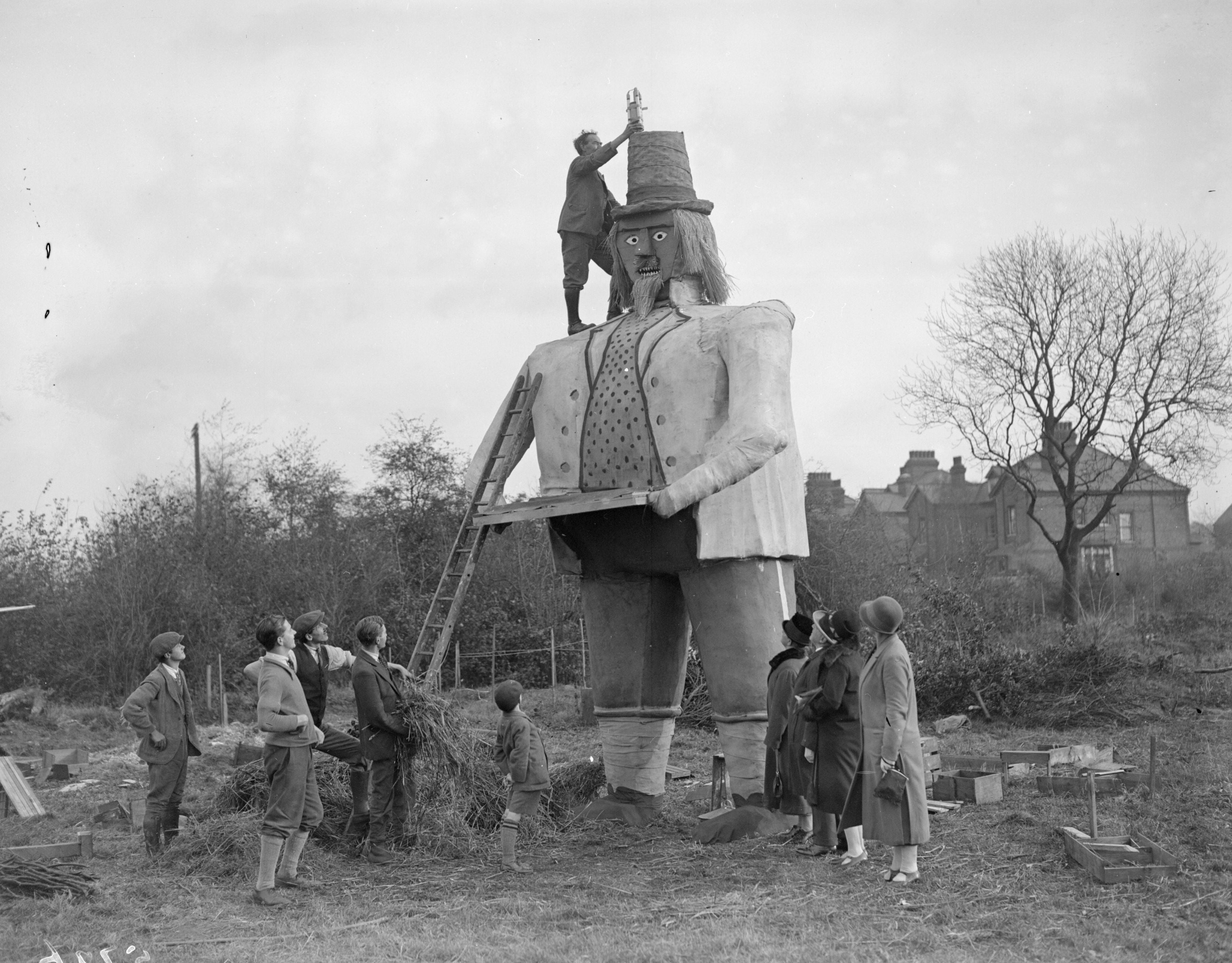 1927: A rocket is fixed to the hat of a 23ft Guy Fawkes effigy, weighing 3 tonnes, in Beckenham