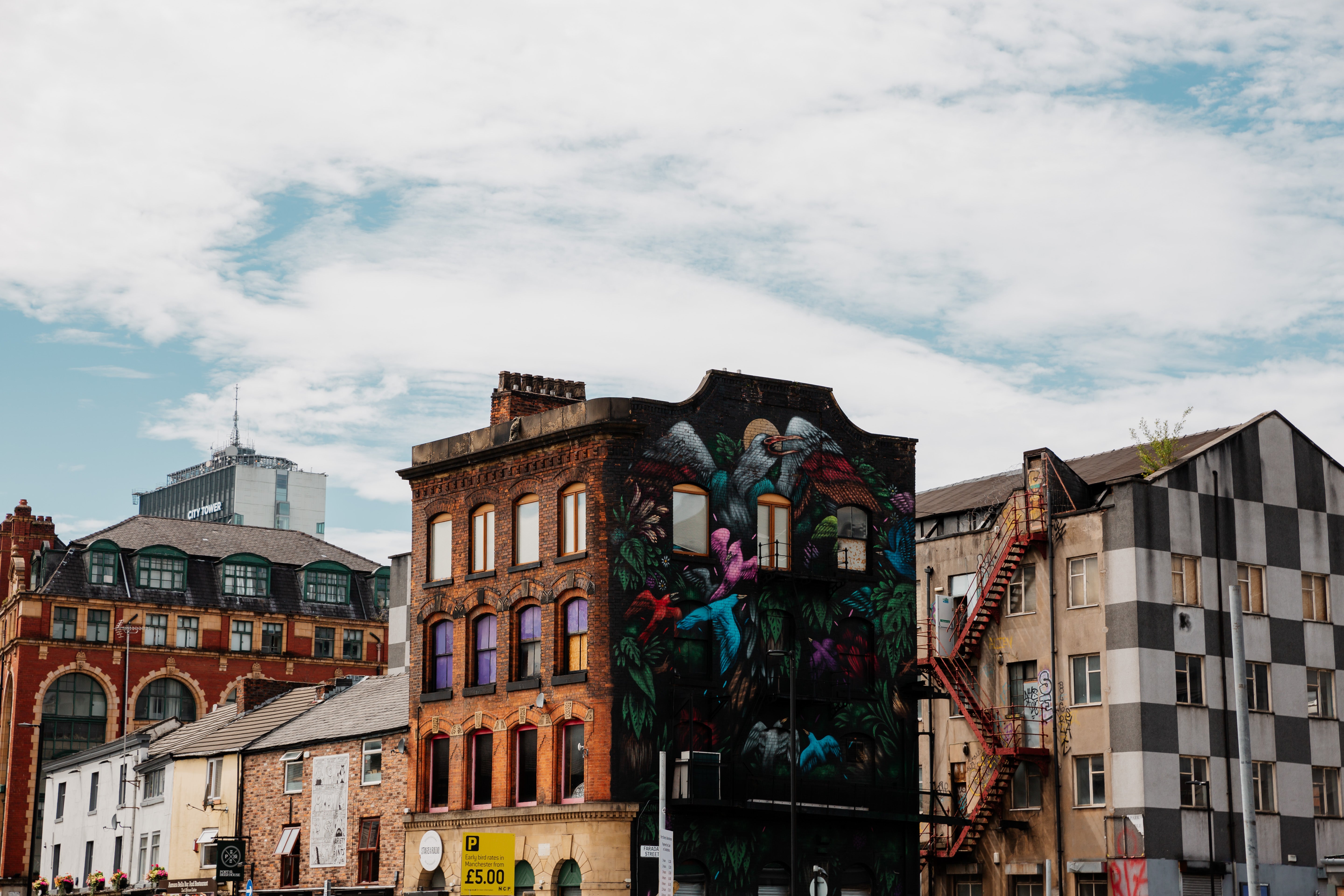 <p>Quirky architecture and street art makes Manchester a delight to wander </p>