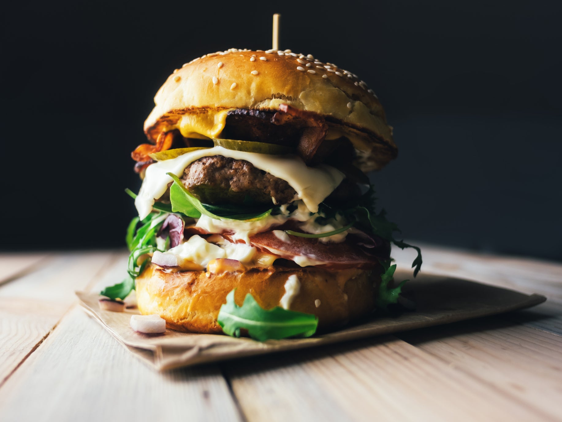 A burger on wooden table