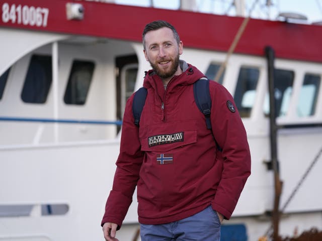 <p>Jondy Ward, the skipper of a Scottish-registered scallop dredger, arrives back at the ‘Cornelis Gert Jan’ in Le Havre on Wednesday </p>