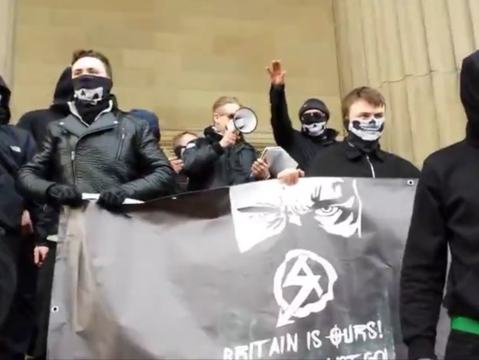 <p>Ben Raymond, centre, speaking at a National Action demonstration in Liverpool in February 2016</p>