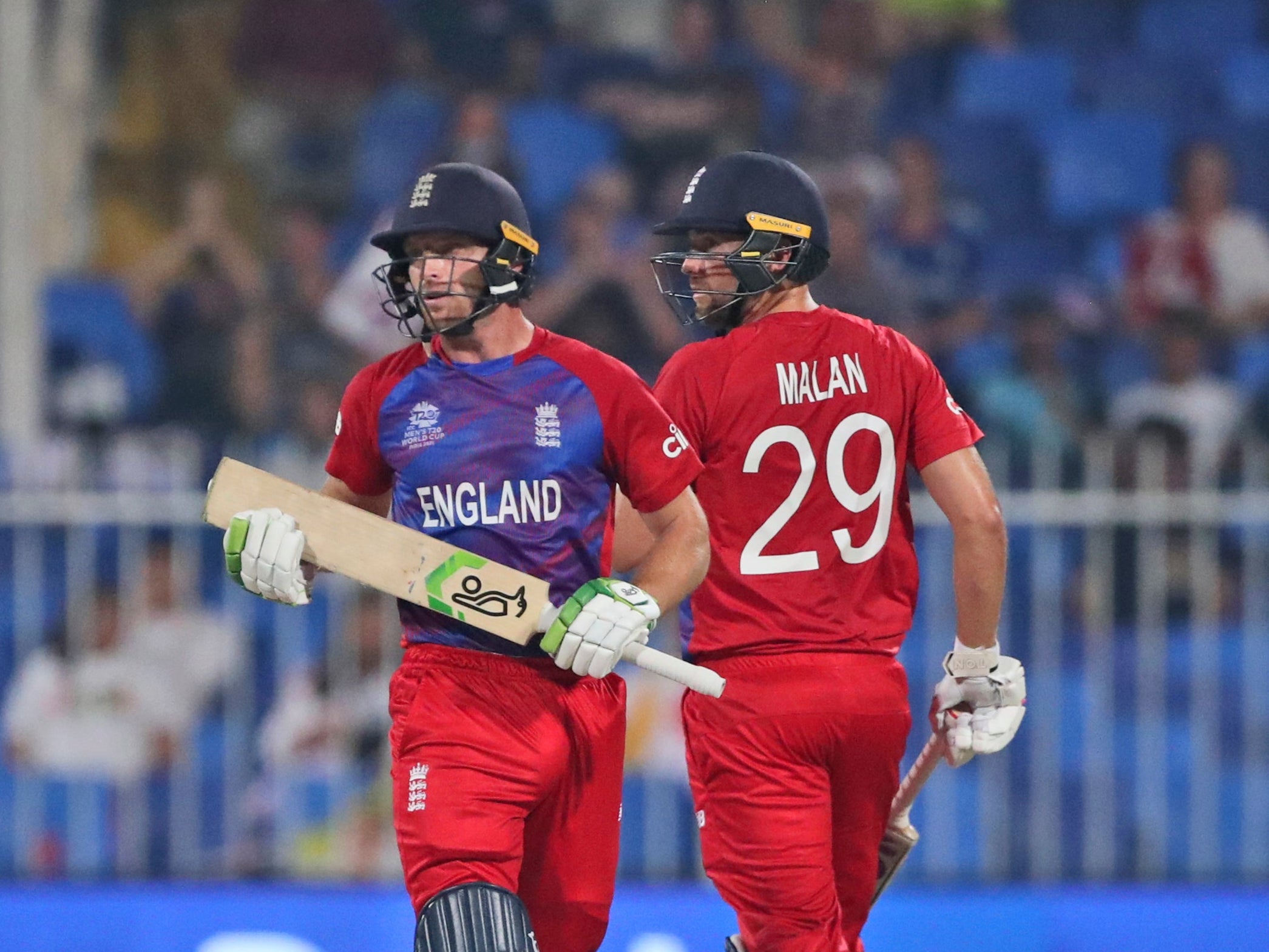Dawid Malan, right, finds himself wishing he could do some of the things Jos Buttler can do (Aijaz Rahi/AP/PA)