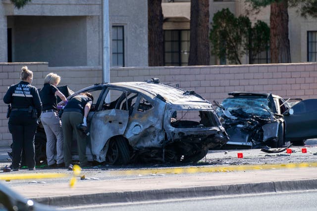 <p>Las Vegas Metro Police investigators work at the scene of a fatal crash Tuesday, Nov. 2, 2021, in Las Vegas</p>