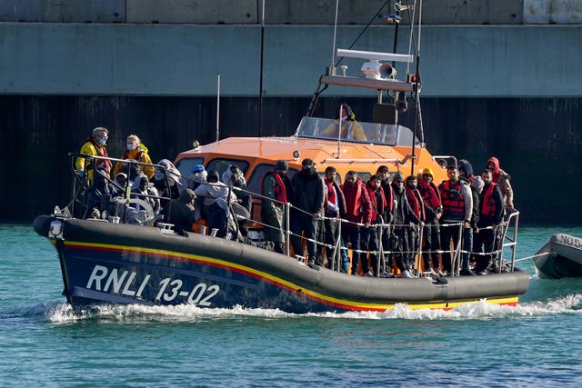 <p>A group of people thought to be migrants are brought in to Dover, Kent on Wednesday, onboard the Dungeness Lifeboat following a small boat incident in the Channel.</p>