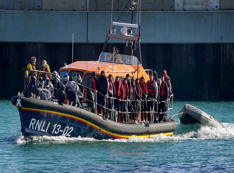 <p>A group of people thought to be migrants are brought in to Dover, Kent on Wednesday, onboard the Dungeness Lifeboat following a small boat incident in the Channel.</p>