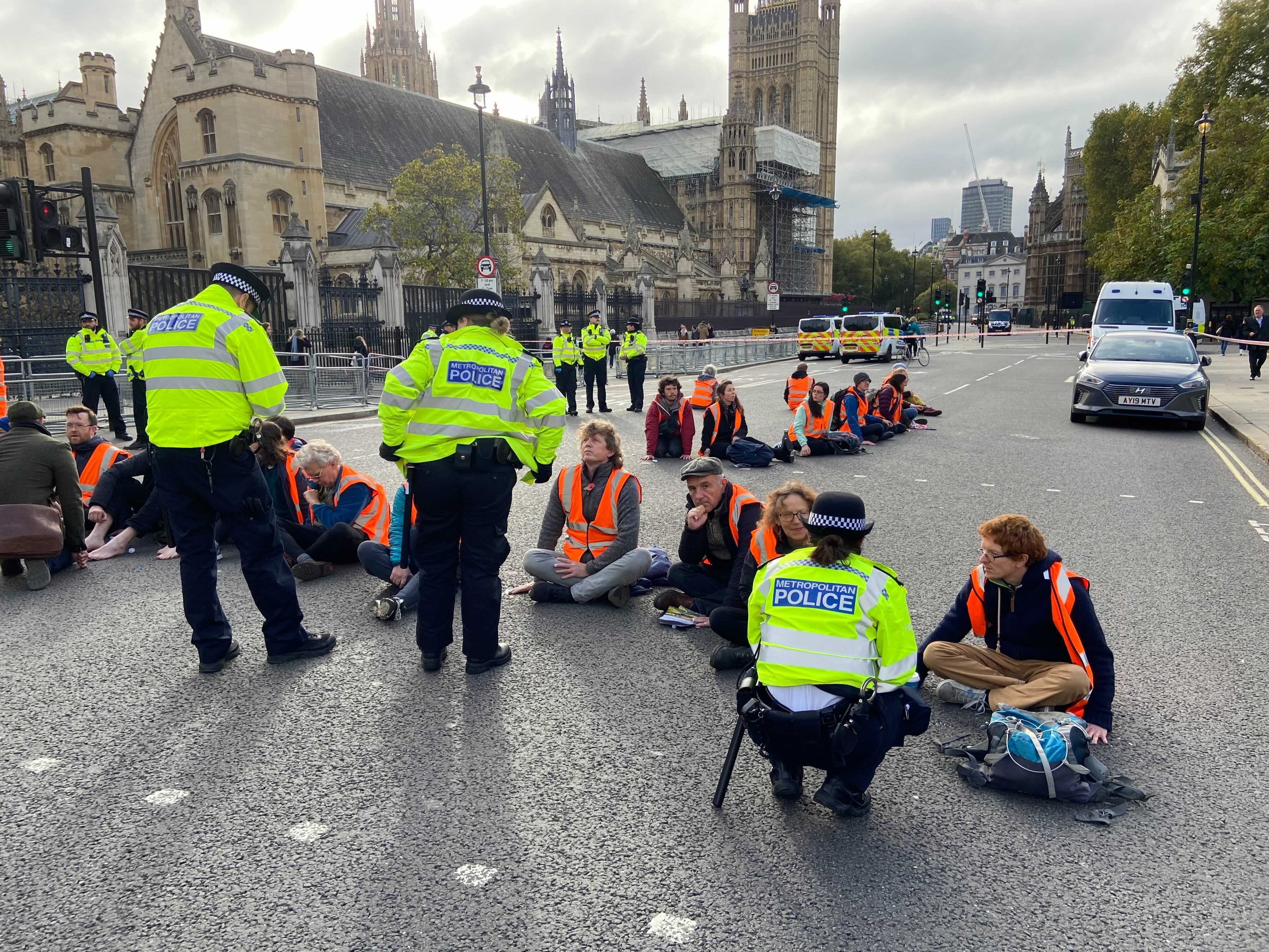 Insulate Britain’s protests included glueing themselves to a road outside Parliament.