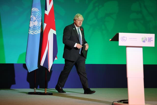 <p>Boris Johnson flew back from the Glasgow climate change summit in order to go to a reunion dinner of Daily Telegraph journalists </p>