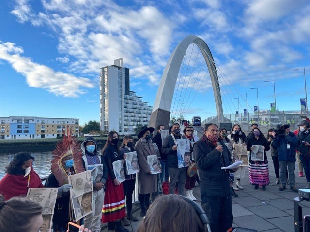 <p>Tom Goldtooth, executive director of the Indigenous Environmental Network, speaks outside the Cop26 climate summit in Glasgow</p>