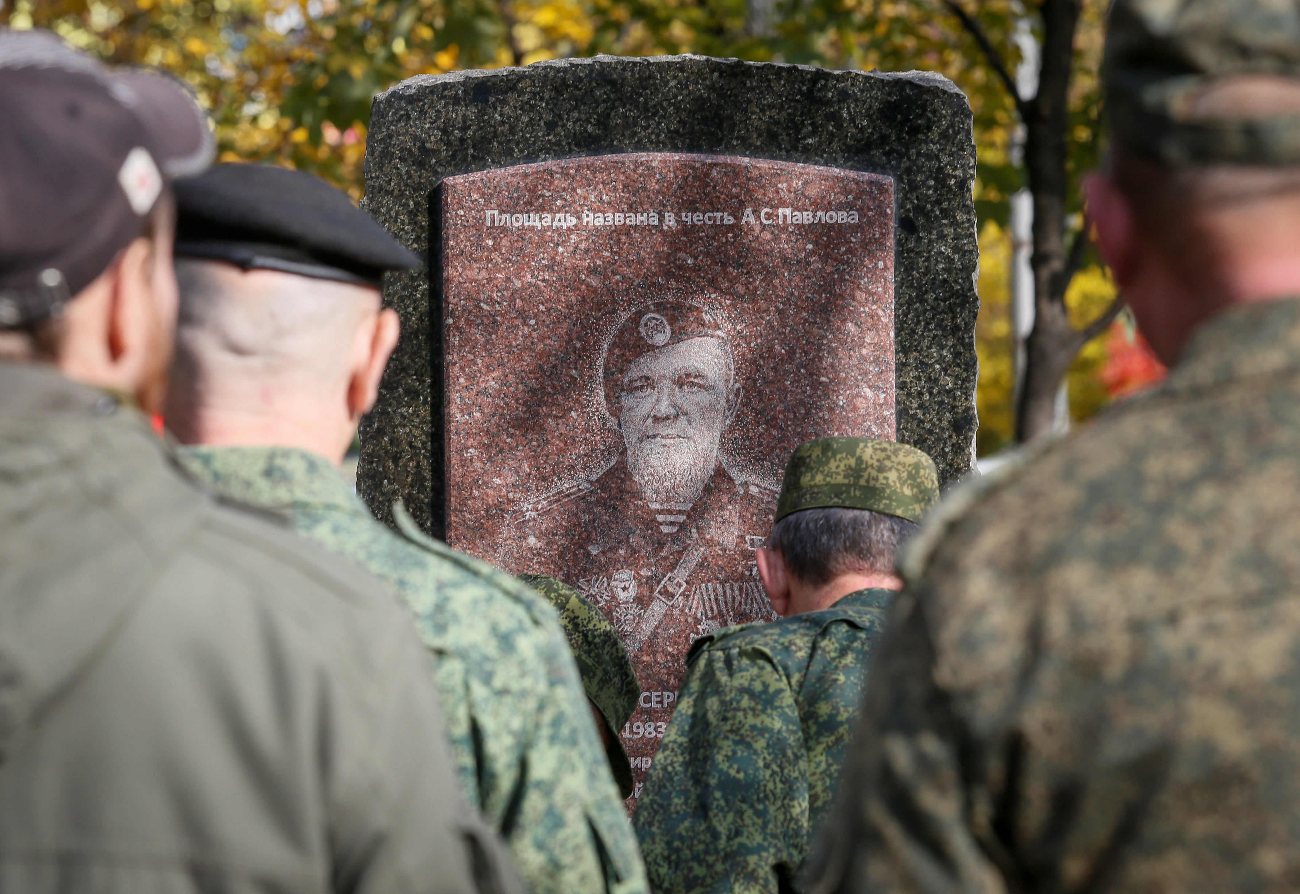 Servicemen line up during an unveiling of the monument in memory of assassinated battalion commander of the separatist self-proclaimed Donetsk People’s Republic Arseny Pavlov, who goes by the nom de guerre “Motorola”, in Donetsk.