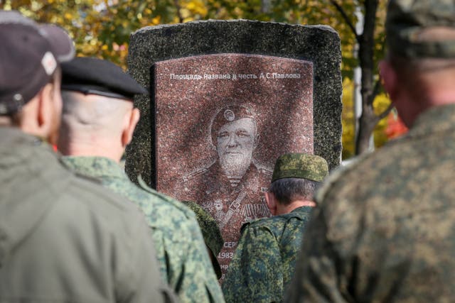 <p>Servicemen line up during an unveiling of the monument in memory of assassinated battalion commander of the separatist self-proclaimed Donetsk People’s Republic Arseny Pavlov, who goes by the nom de guerre “Motorola”, in Donetsk.</p>