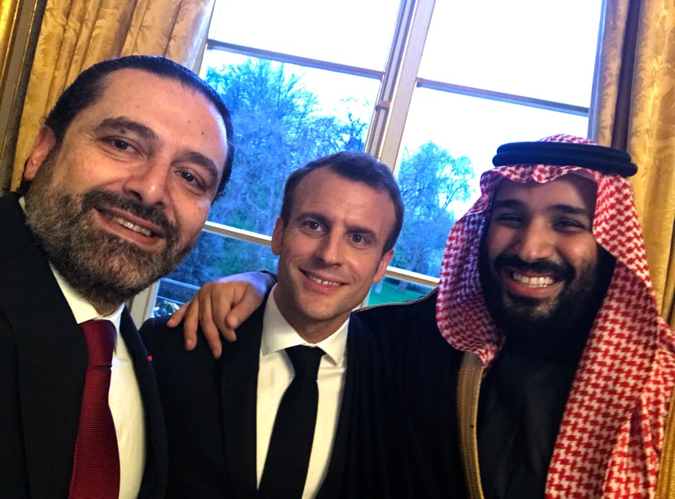 <p>This photo released on the official twitter page of Lebanese Prime Minister Saad Hariri in April 2018, shows Hariri, left, taking a selfie photo with French President Emmanuel Macron, center, and Saudi Arabia's Crown Prince Mohammed bin Salman, right, in the King George V Hotel, in Paris, France</p>