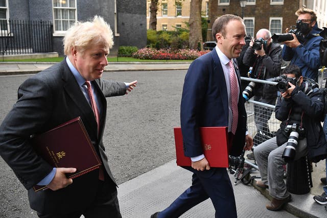 <p>Boris Johnson and Matt Hancock pictured near Downing Street in September 2020 </p>