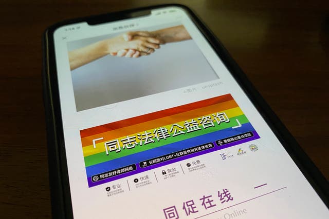 <p>An online post about the work of the group with a link to their social media account is displayed on a phone in Beijing on Friday </p>
