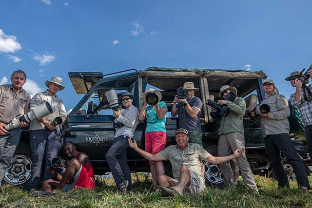<p>Wild smiles: a photographic safari group in Kenya’s Maasai Mara</p>