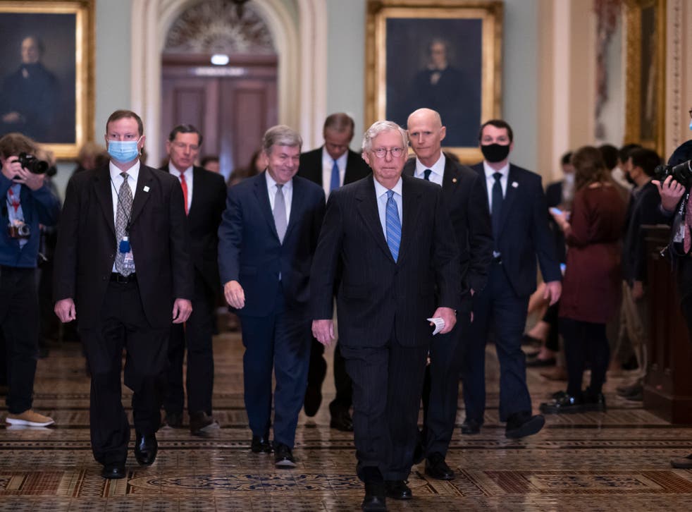 <p>Senate minority leader Mitch McConnell leads his fellow Republicans after a GOP policy meeting at the US Capitol </p>