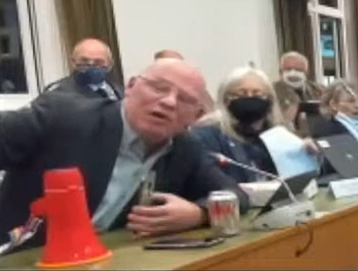 Council meeting descends into chaos as megaphone used during furious row between councillors