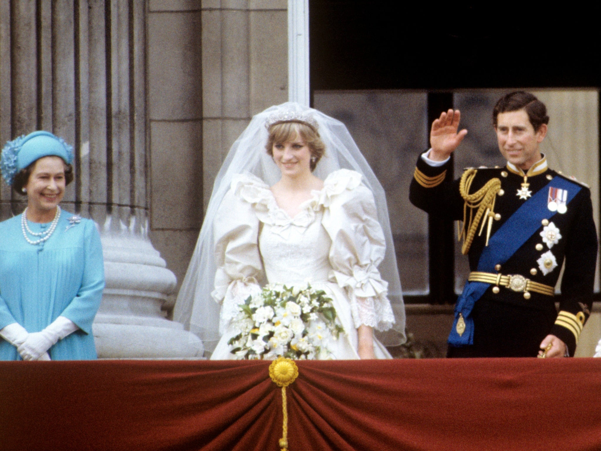 The Queen with Princess Diana and Prince Charles on the balcony of Buckingham Palace on their wedding day in 1981