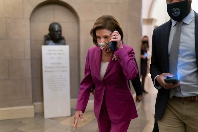 <p>Speaker of the House Nancy Pelosi, D-Calif., arrives to lead Democrats in advancing President Joe Biden's $1.85 trillion-and-growing domestic policy package, at the Capitol in Washington</p>