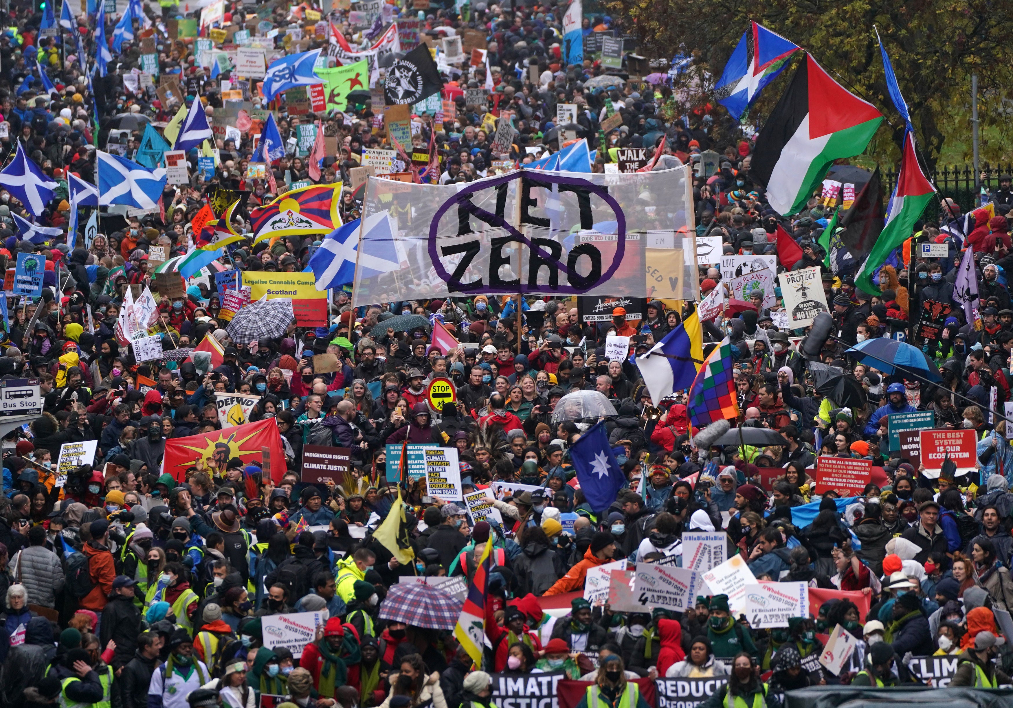 Protesters in a rally organised by the Cop26 Coalition in Glasgow demanding global climate justice on Saturday