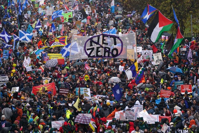 <p>Protesters in a rally organised by the Cop26 Coalition in Glasgow demanding global climate justice on Saturday </p>
