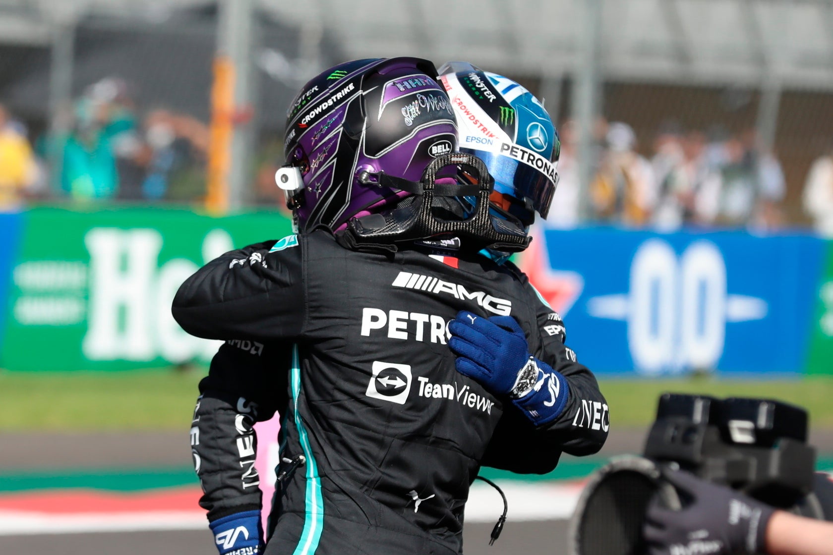 Lewis Hamilton (left) will start second behind team-mate Valtteri Bottas (Edgard Garrido/AP)