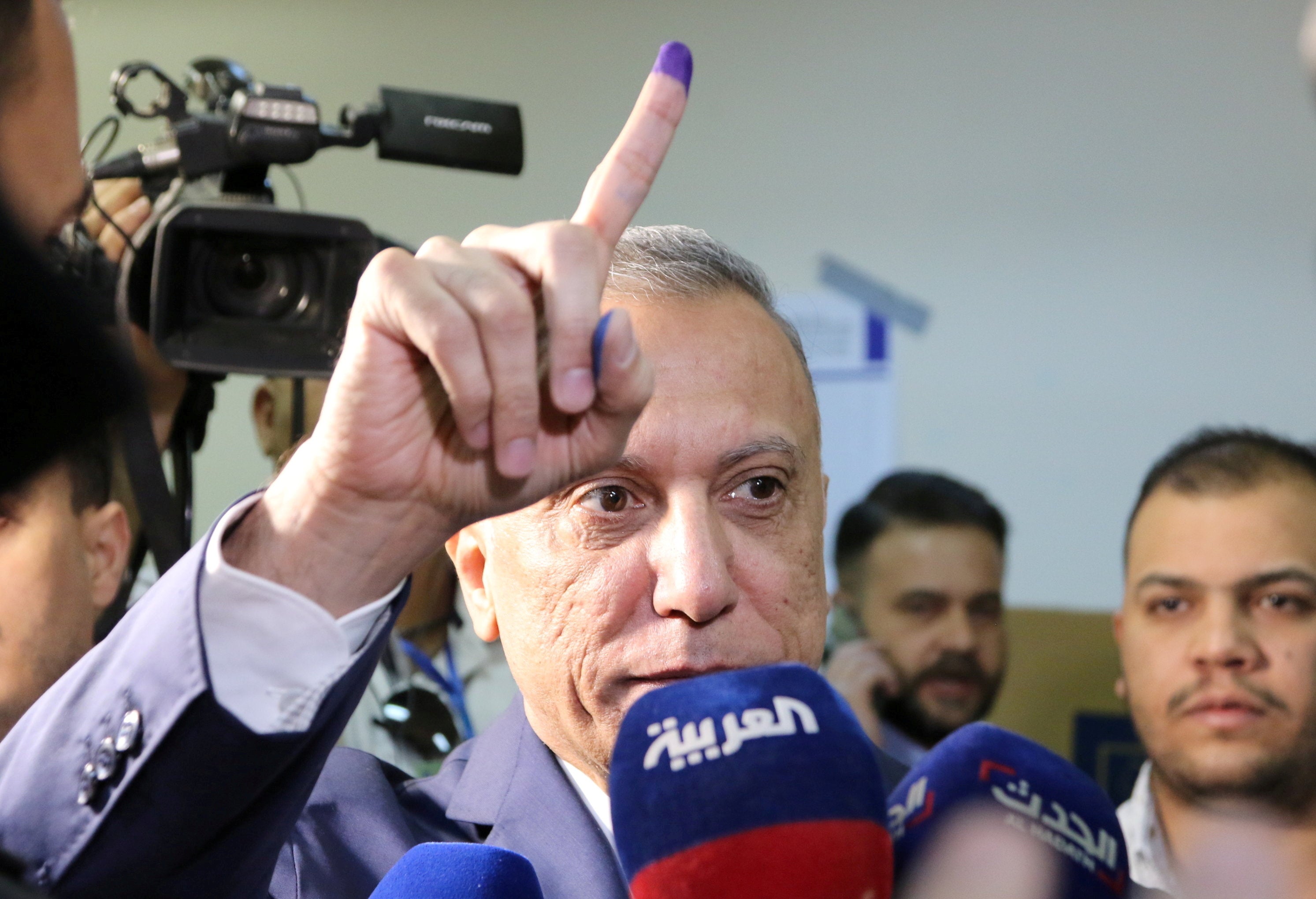 Mustafa Al-Kadhimi, pictured here during October elections, survived an assassination attempt in the early hours of Sunday