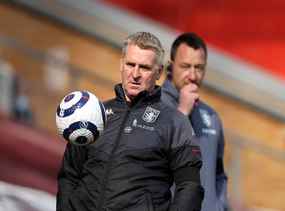 <p>John Terry, right, was previously part of Dean Smith’s backroom team</p>