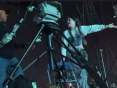‘There’s someone dead in there!’: Videos show Astroworld concertgoers climbing camera tower to beg for help