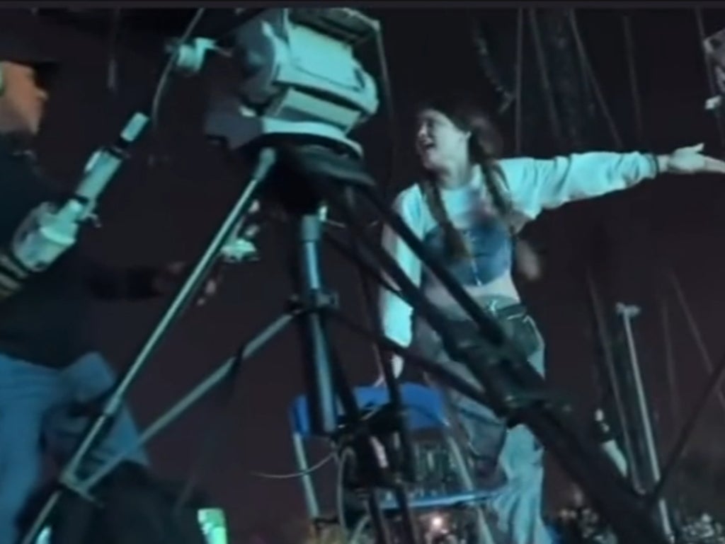 ‘There’s someone dead in there!’: Videos show Astroworld concertgoers climbing camera tower to beg for help