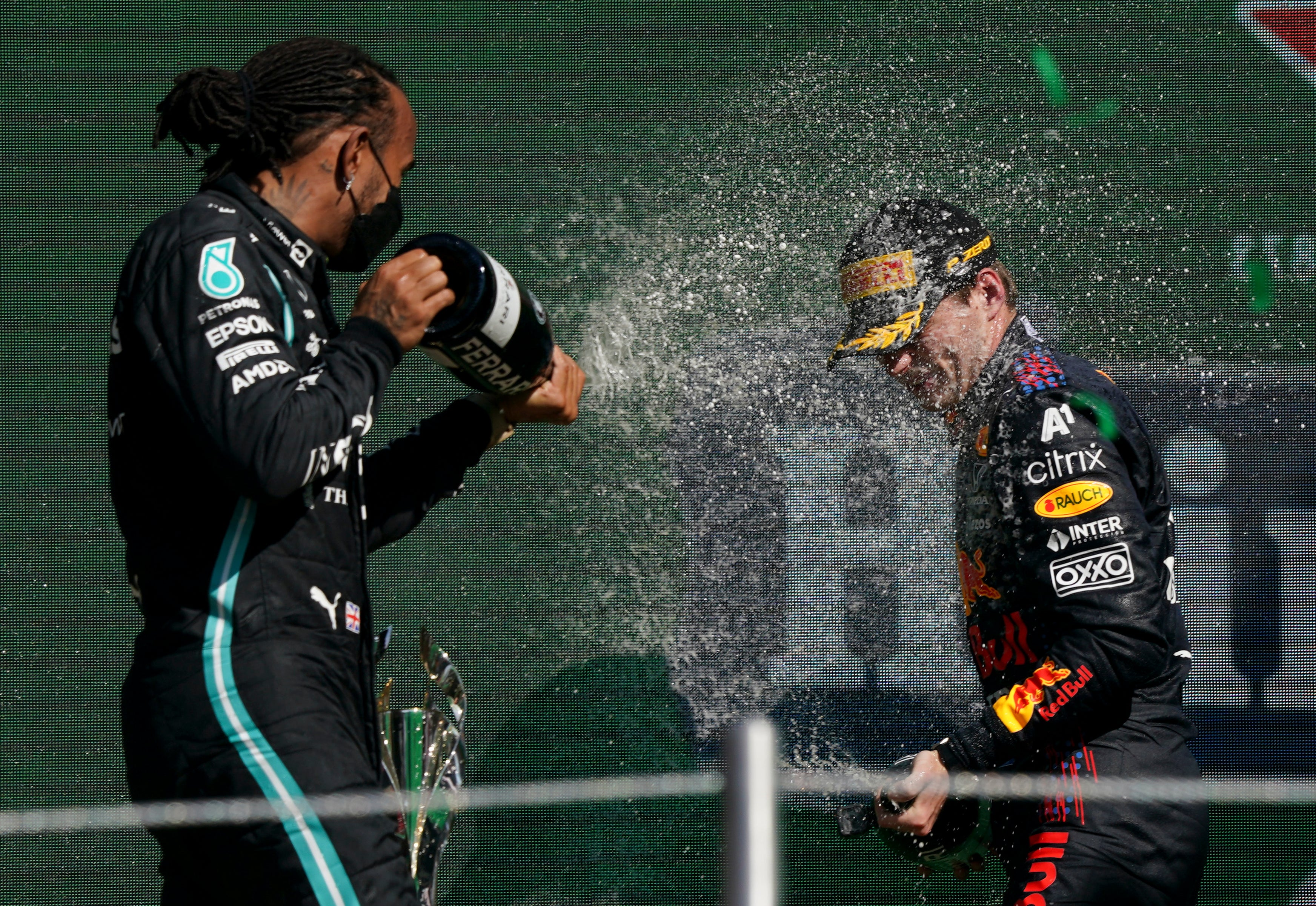 Verstappen, right, extended his drivers’ championship lead over Lewis Hamilton (AP Photo/Fernando Llano)