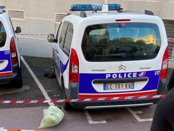 A knifeman has been shot after attacking three police officers outside a police station in Cannes, southern France