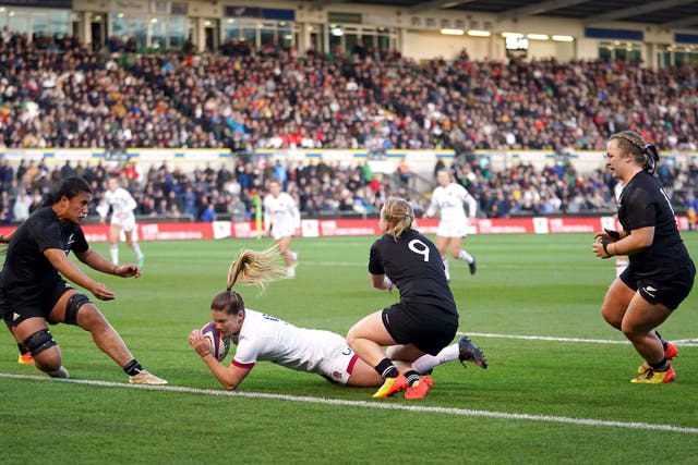 <p>Scrum-half Leanne Infante scores a try against New Zealand</p>