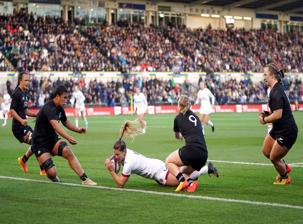 <p>Scrum-half Leanne Infante scores a try against New Zealand</p>