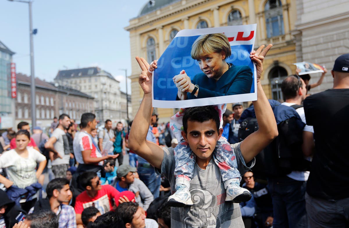 Germany's Merkel on 2015 migrant influx: 'we managed it'