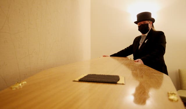 People are paying for full-service funerals again (Jonathan Brady/PA)